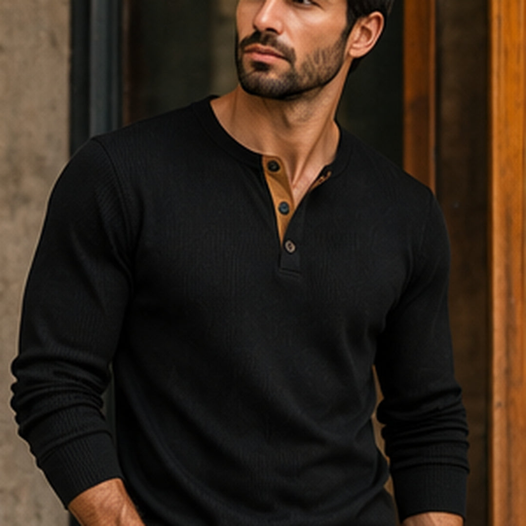 Man wearing the waffle knit henley in black