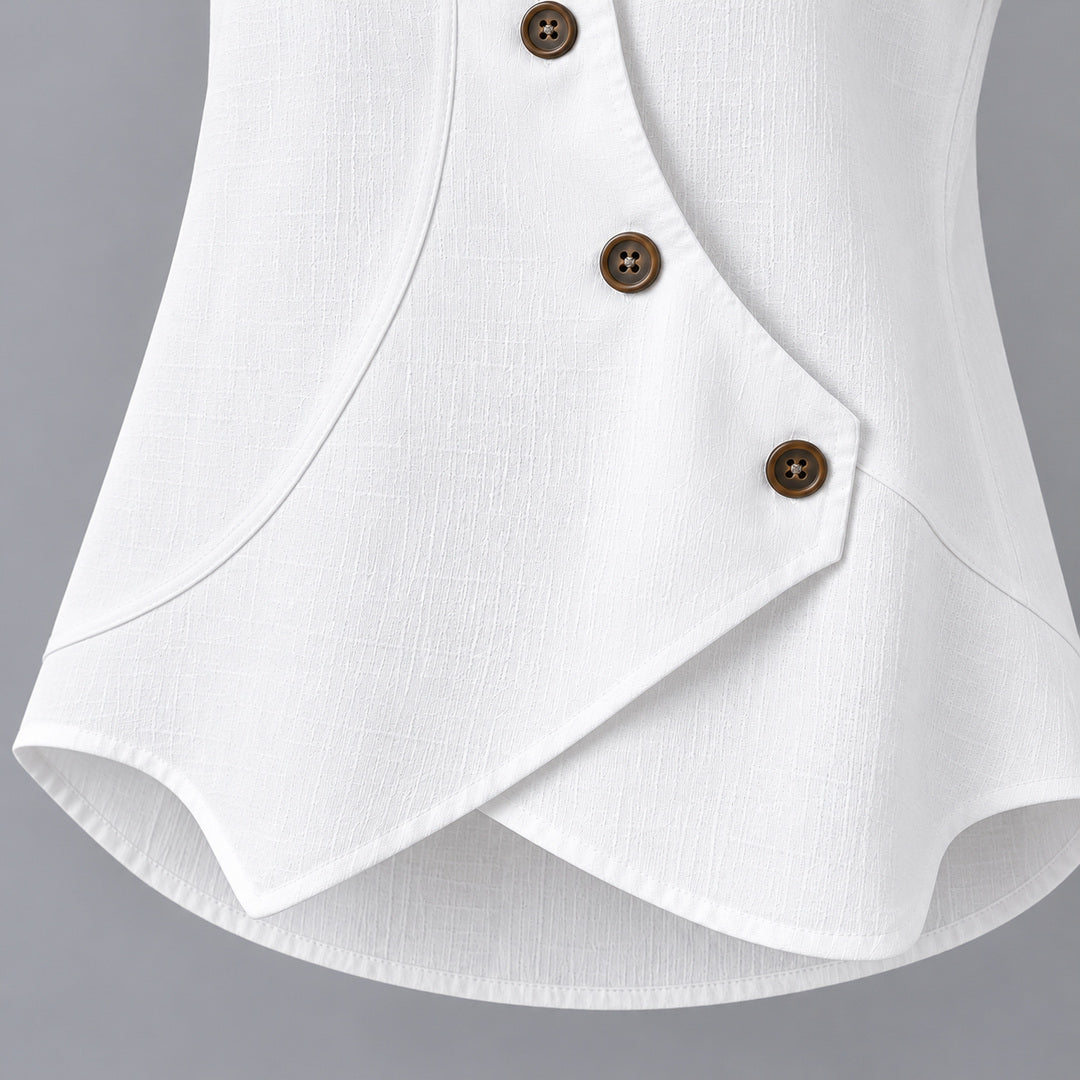 Close-up of the asymmetric button front and wrap hem